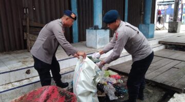 Brimob Polda Aceh Tingkatkan Kepedulian Lingkungan Lewat Bakti Sosial di Kawasan Perdagangan